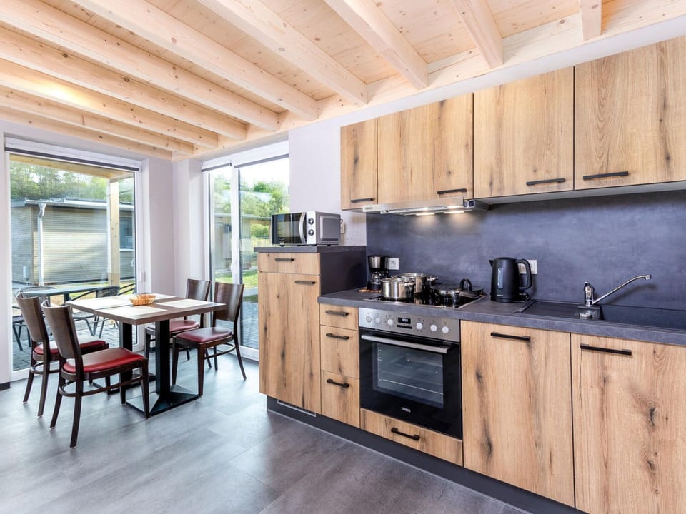 Bungalow | Private kitchen | Electric kettle, highchair