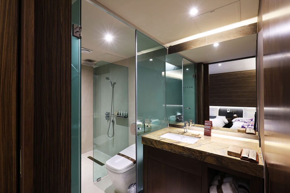 Designer toiletries, hair dryer (on request), bathrobes, slippers