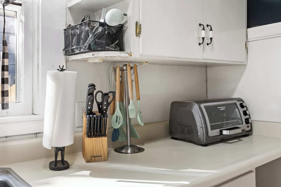 Kitchen: Whip up delicious meals in our charming kitchen. It's cozy, functional, and ready for your culinary adventures!