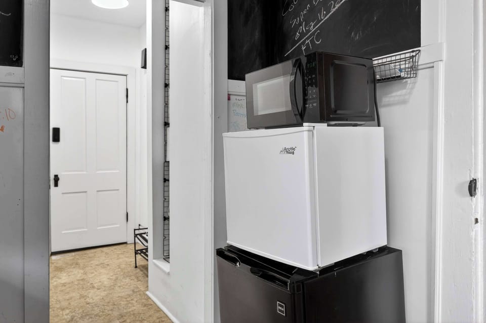 Kitchenette: This convenient kitchenette includes essential small appliances to prepare quick meals, snacks, or your morning coffee with ease.