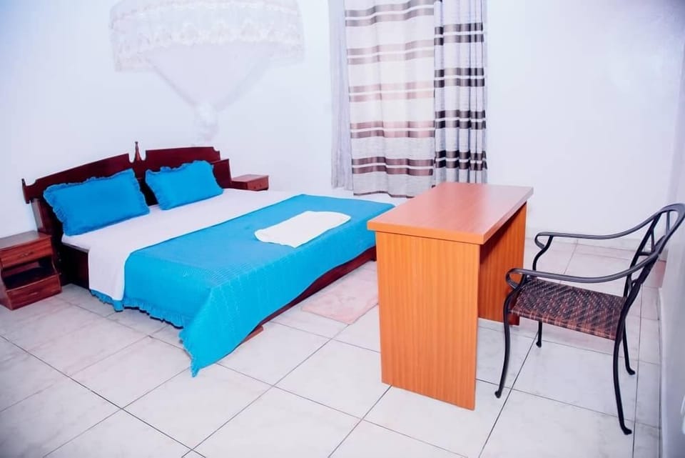 Room | In-room safe, desk, iron/ironing board, WiFi (free)