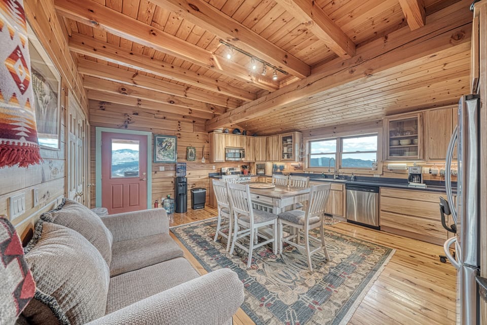 Kitchen with view of front door. You would enter through this door and immediately into the kitchen area.