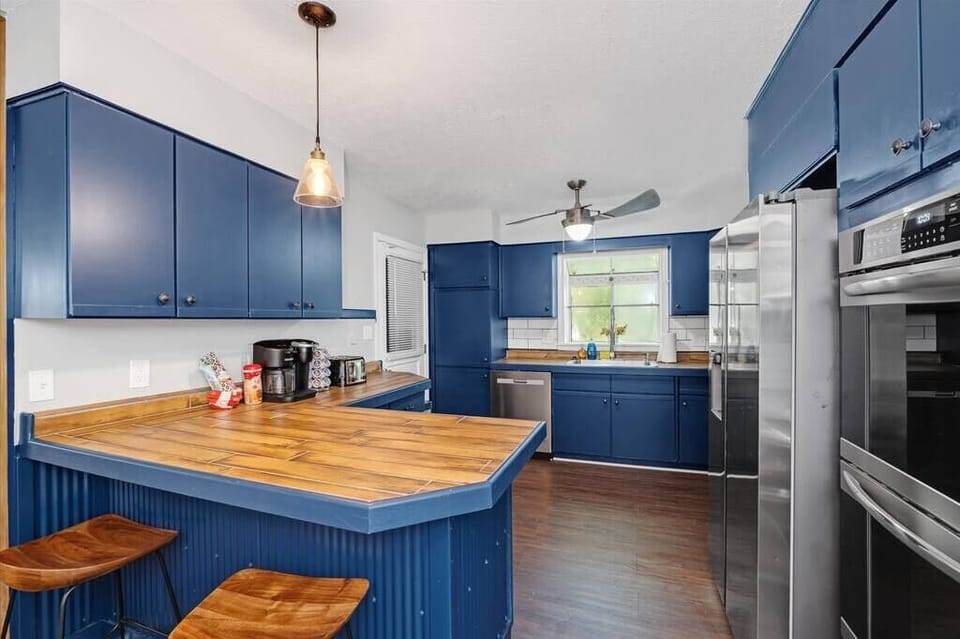 Full kitchen with brand new stainless steel appliances and dual coffee maker (Keurig on one side, drip coffee on the other side)
