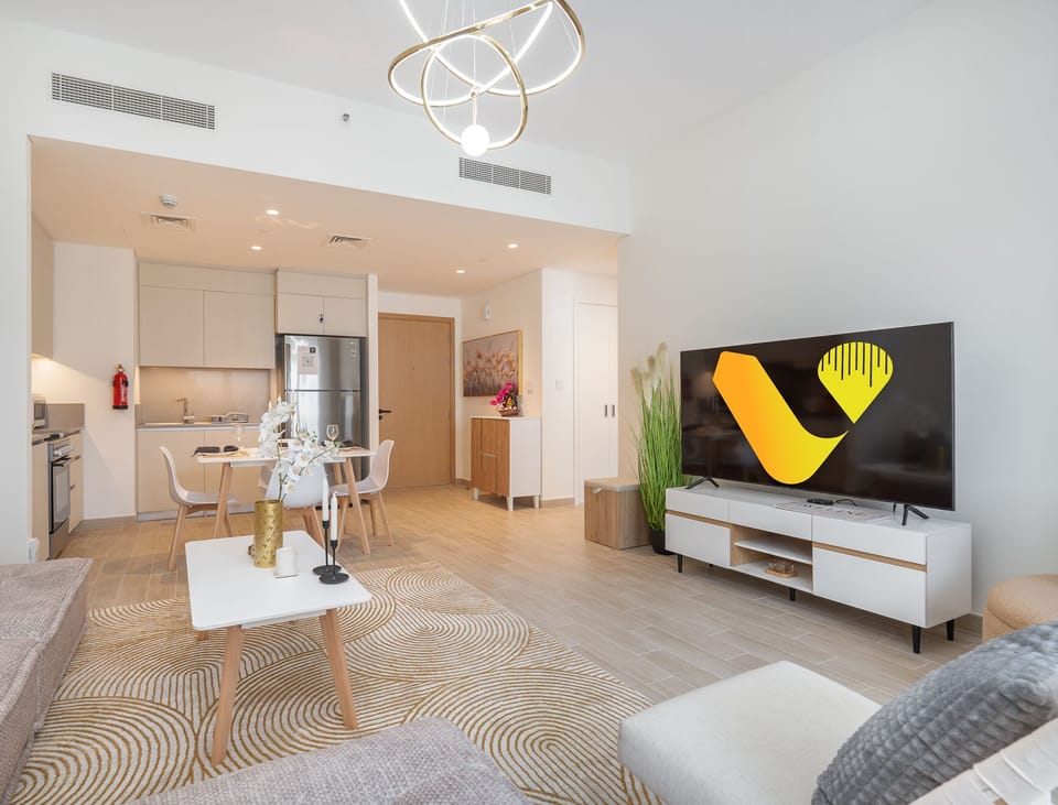 Luxury Apartment | Living area | 65-inch Smart TV with cable channels