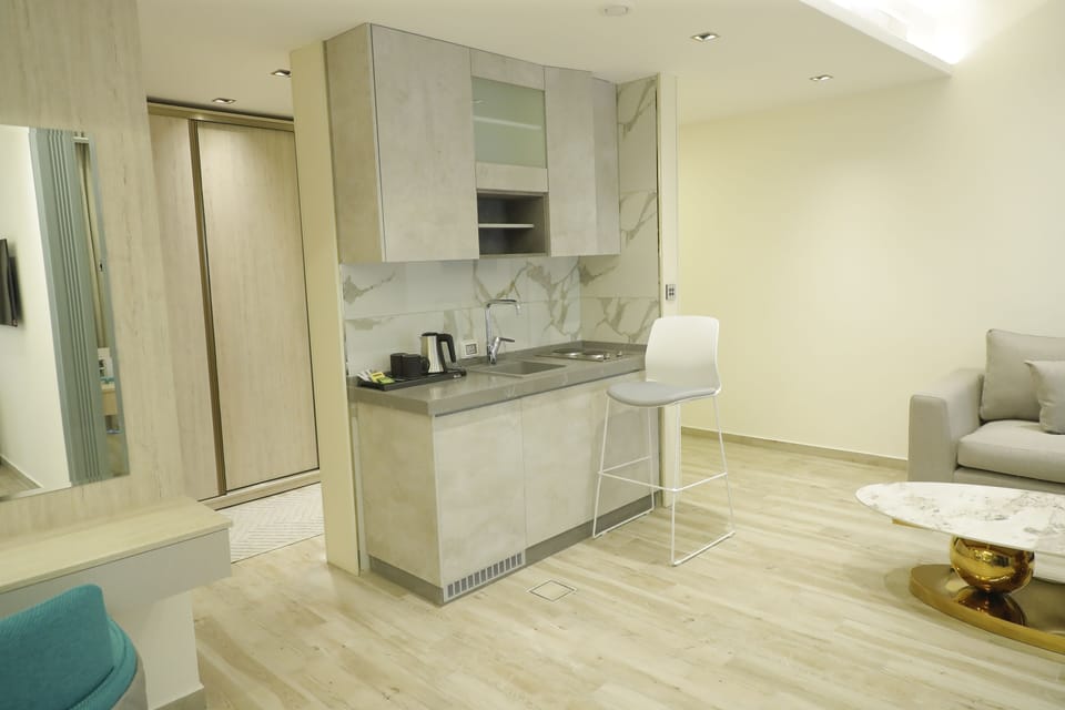 Suite, City View | Private kitchenette | Highchair