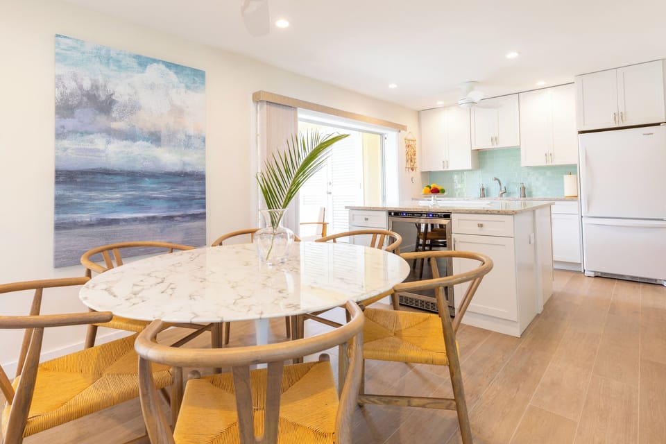 Formal dining area with seating for six. 
