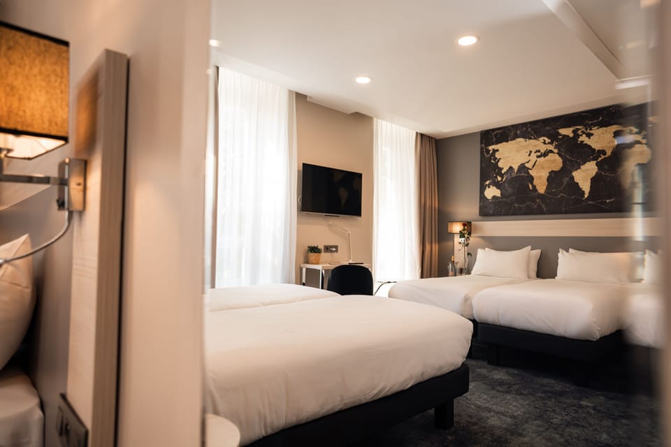 Quadruple Room | In-room safe, blackout drapes, iron/ironing board, free WiFi