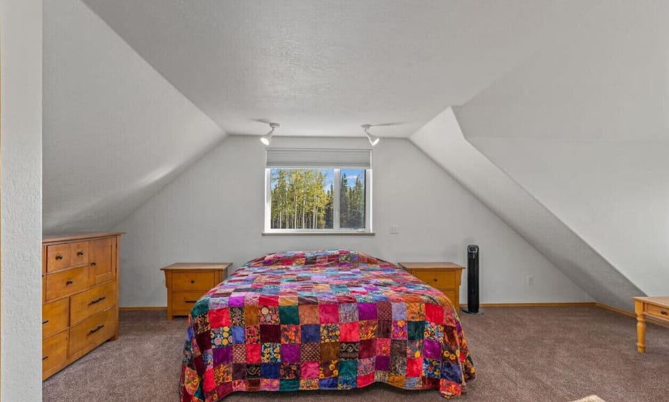 Upstairs bedroom with king size bed.