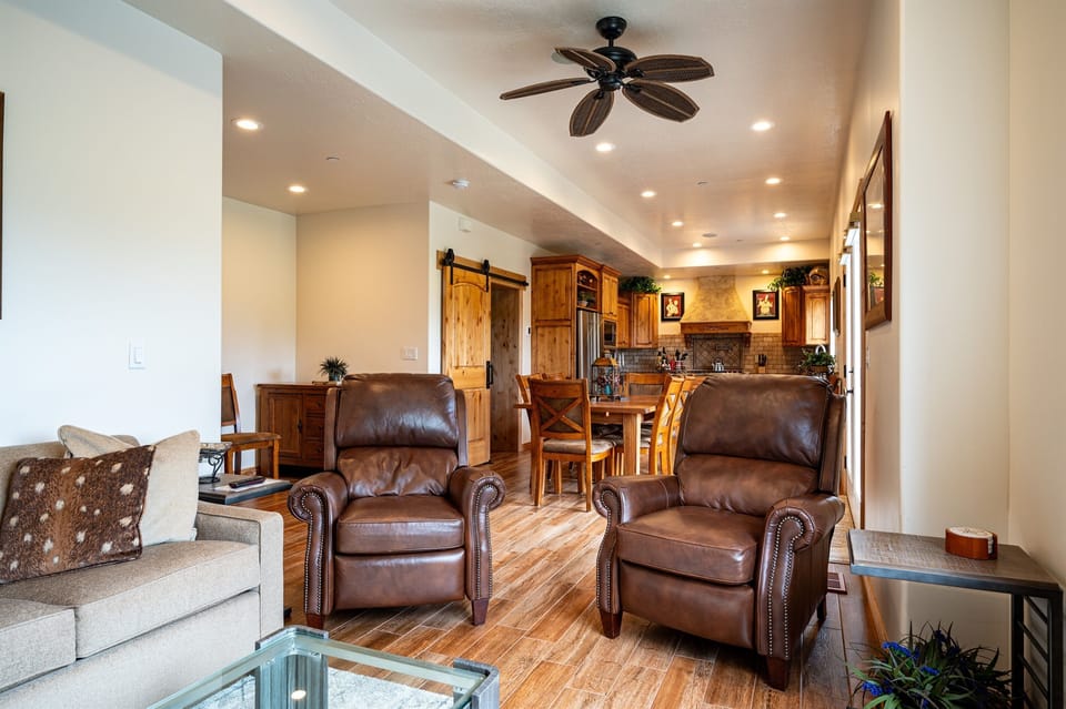 Experience seamless living in our open-concept kitchen, dining, and living area, perfect for socializing and entertaining.