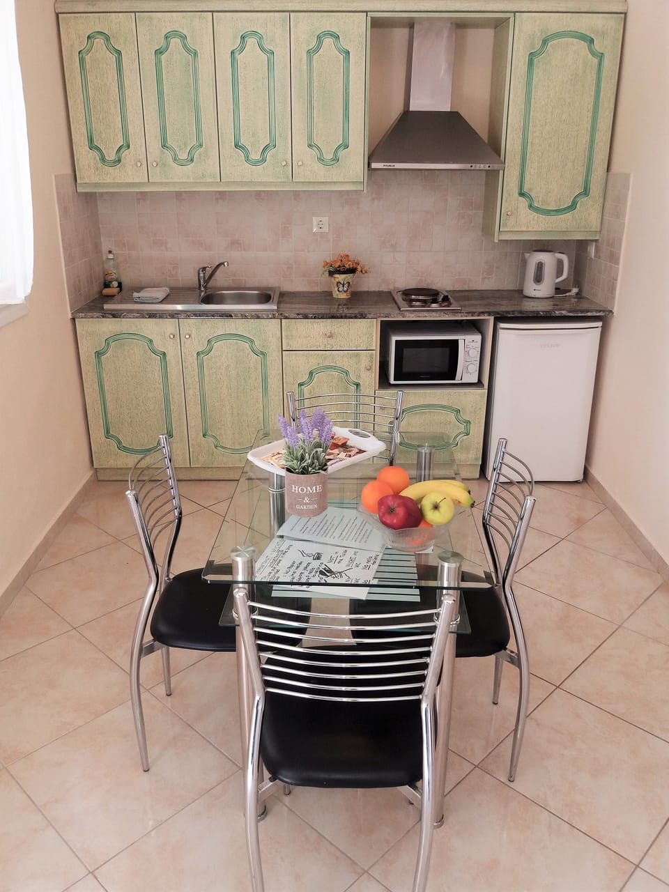 Apartment, 2 Bedrooms | Private kitchen | Fridge, microwave, stovetop, coffee/tea maker