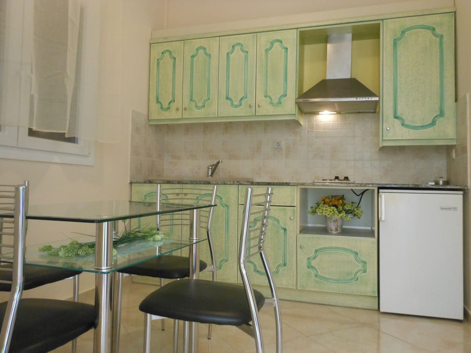 Apartment, 2 Bedrooms | Private kitchenette | Fridge, microwave, stovetop, coffee/tea maker