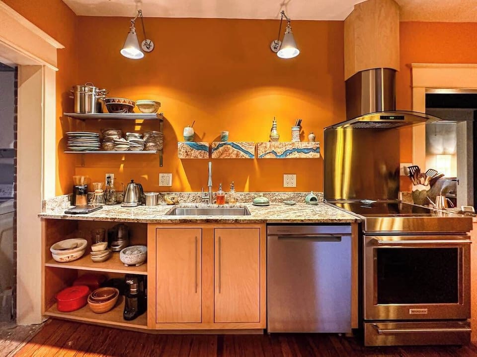 Kitchen with wooden details and open shelving