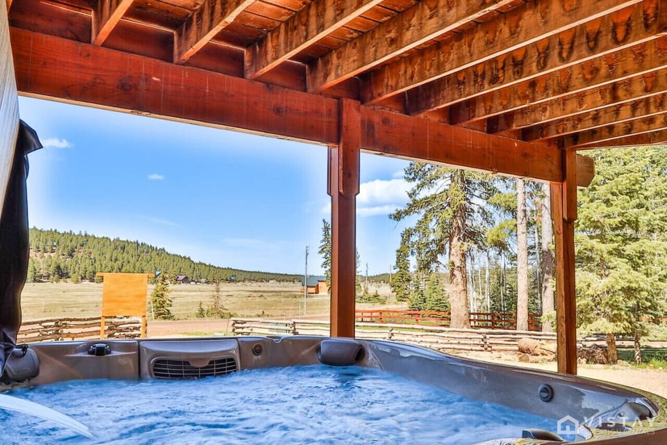 Relax and unwind in the cabin`s hot tub, perfect for a soothing evening after a day of adventure or simply for enjoying the serene surroundings.