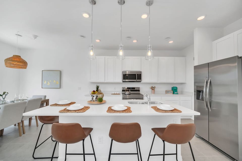 Modern kitchen with a large island and stainless steel appliances