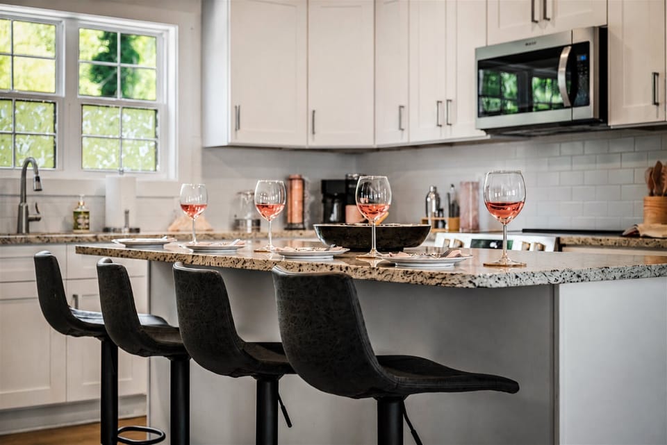 The kitchen island tends to become the unofficial headquarters of the weekend.