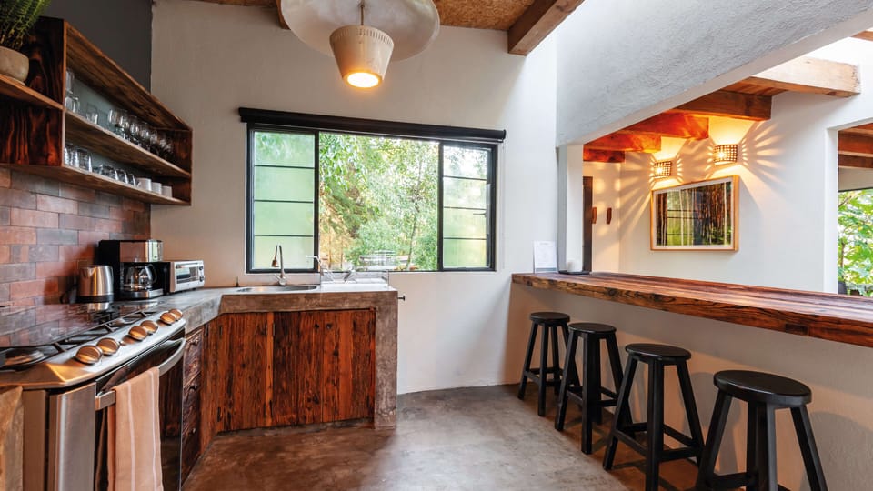 Comfort Chalet | Private kitchen | Coffee/tea maker, full-size fridge, microwave, oven