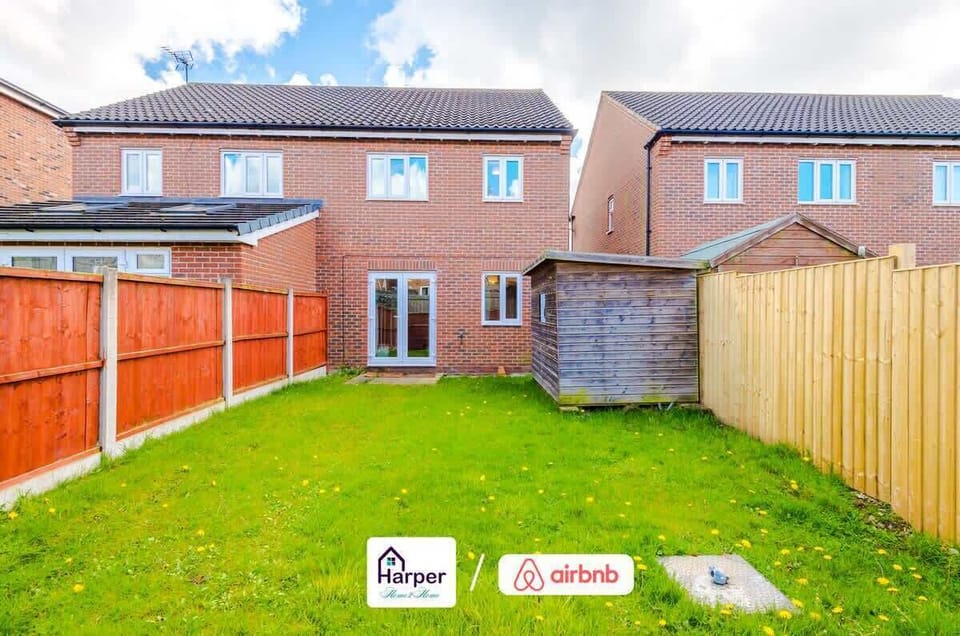 Spacious fenced garden with direct access from the lounge — ideal for fresh air or family time.Perfect outdoor spot to unwind after a busy day.
Safe, private, and well-maintained for guest enjoyment.