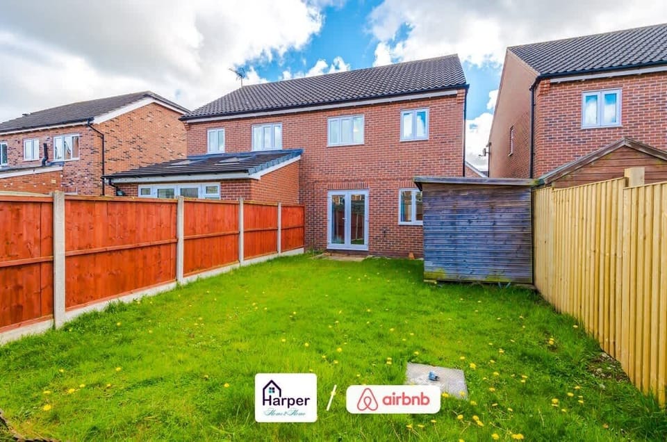 Spacious fenced garden with direct access from the lounge — ideal for fresh air or family time.Perfect outdoor spot to unwind after a busy day.
Safe, private, and well-maintained for guest enjoyment.
