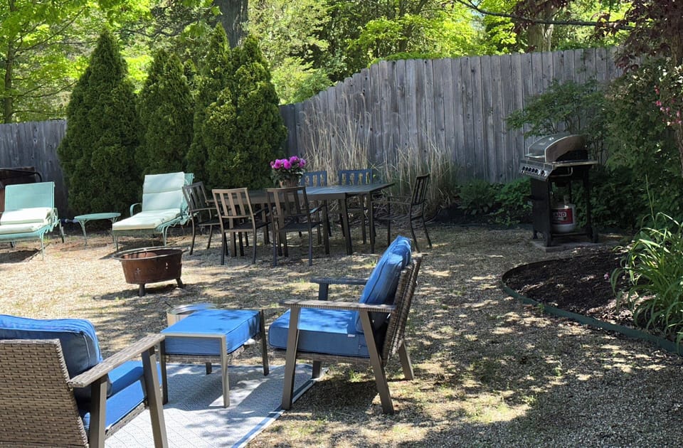 Outdoor dining area with a gas grill!