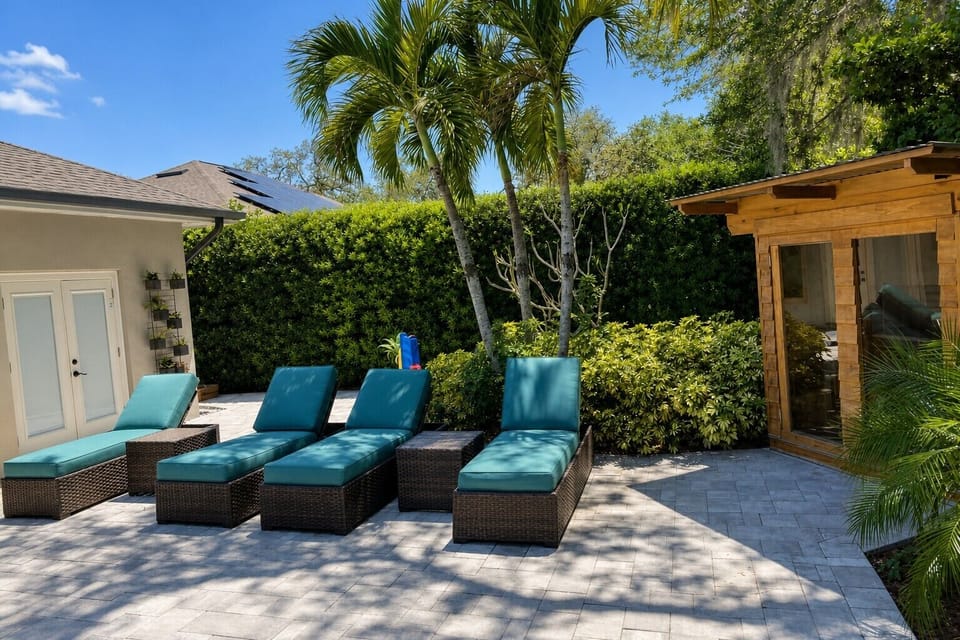 Kick back on poolside loungers under the shady pergola.