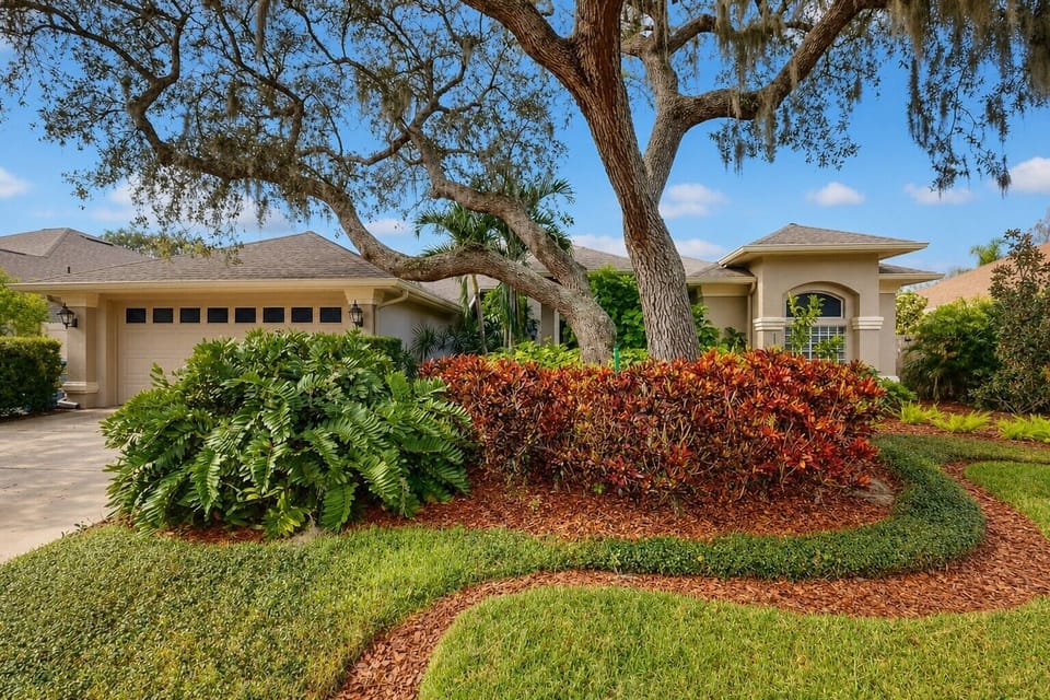Colorful landscaping creates a warm front-yard welcome.