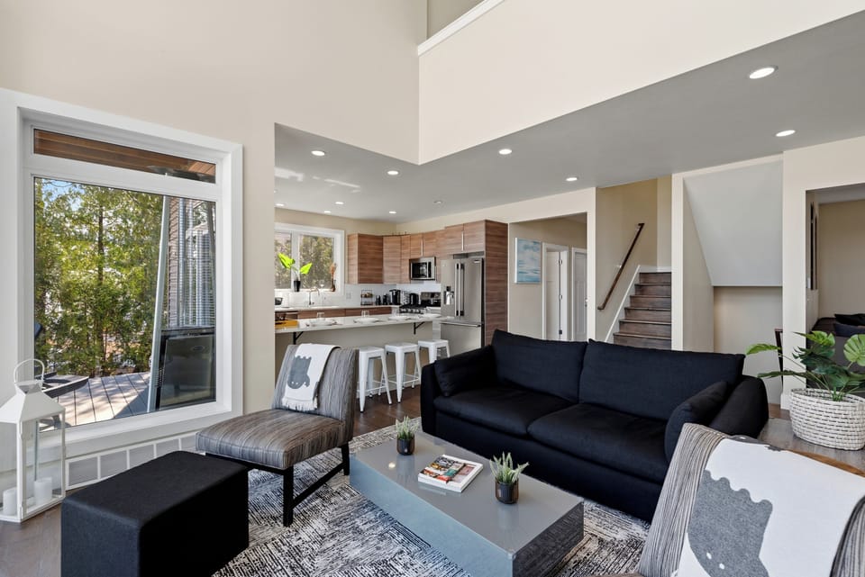 Open dining, kitchen, living room layout. 