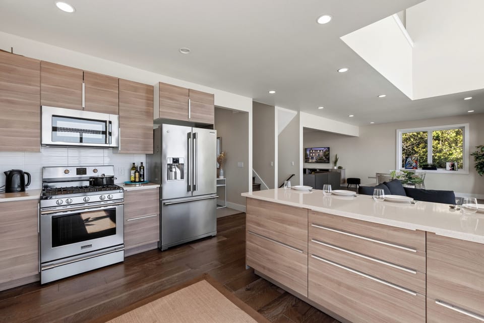 Gleaming kitchen with high end appliances. 
