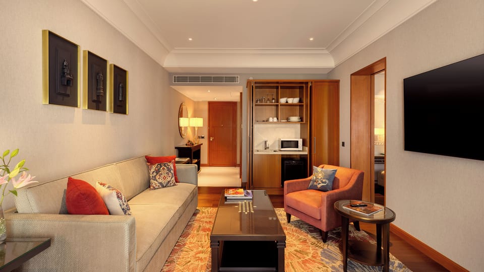 Rudra Suite | Living area | 65-inch Smart TV with satellite channels