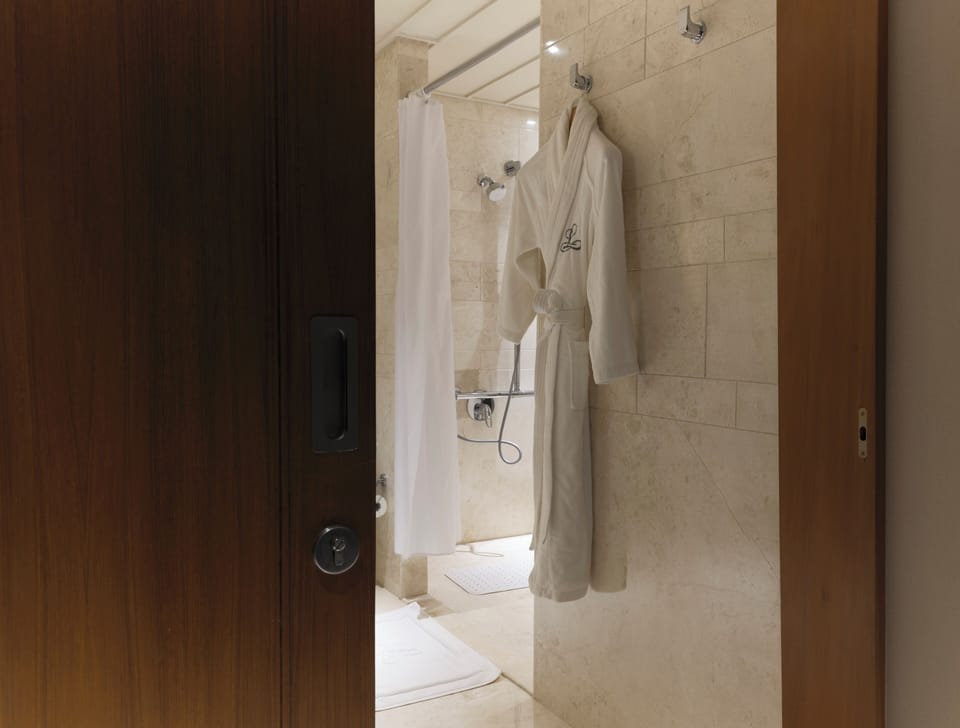 Shower, free toiletries, hair dryer, bathrobes