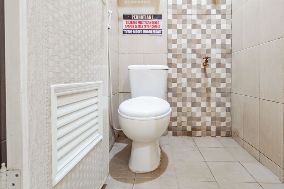 Economy Double Room | Bathroom | Shower, towels, soap