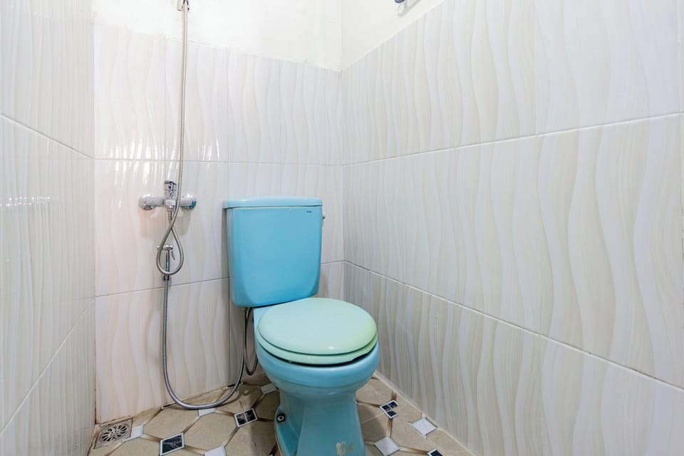 Basic Double Room | Bathroom | Shower, towels, soap