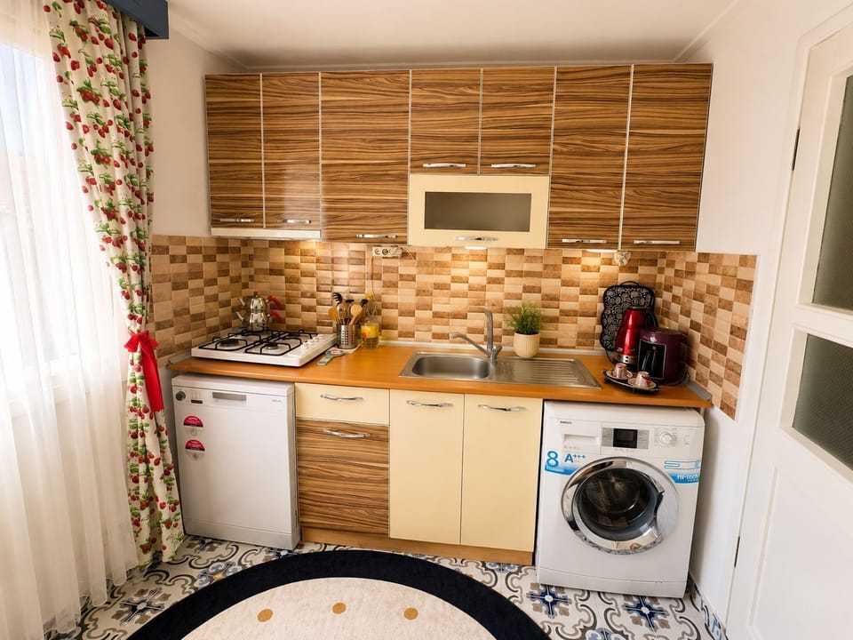 Apartment, Sea View | Private kitchen | Highchair