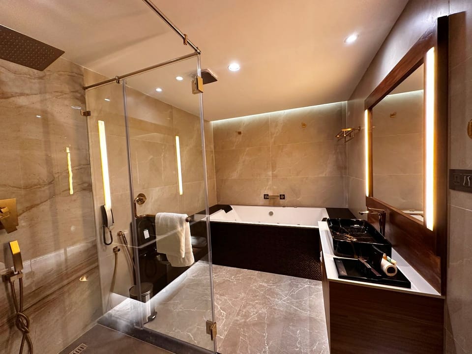 Luxury mountain view jacuzzi stone cottage | Bathroom | Shower, free toiletries, hair dryer, slippers