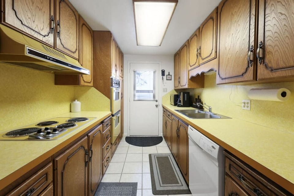 Galley kitchen, fully stocked