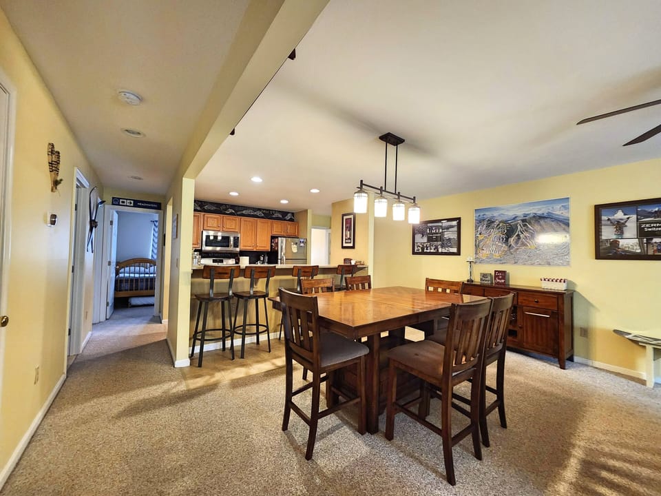 Dining/kitchen area with 3rd bedroom visible