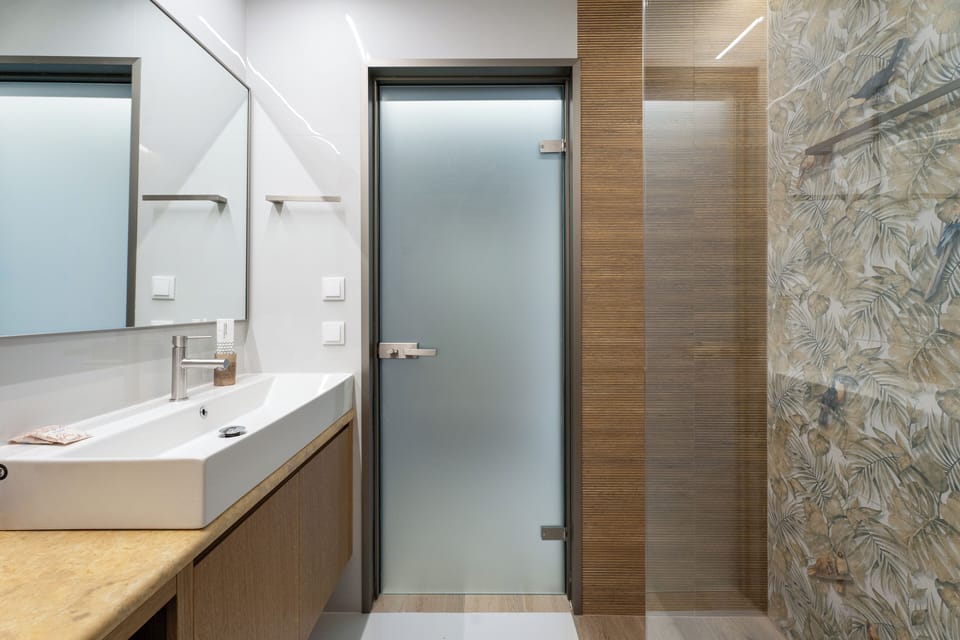 Exclusive Suite, Private Pool | Bathroom | Shower, hair dryer, slippers, towels