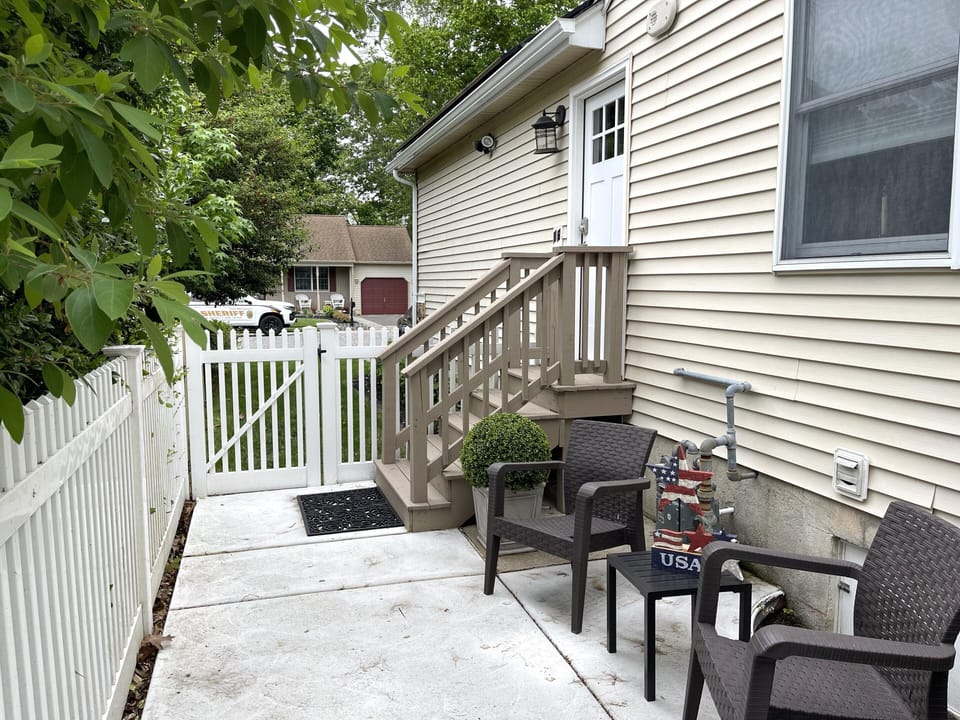 Private entrance with patio area