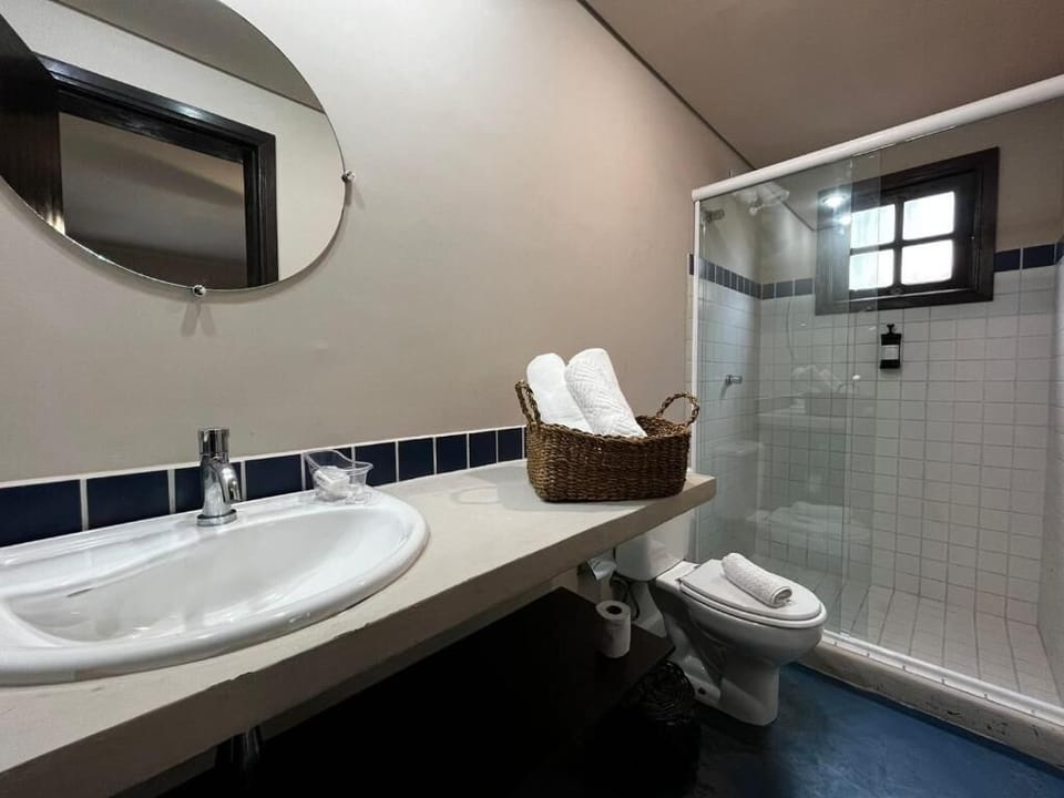 Standard Studio, Courtyard View | Bathroom | Shower, hair dryer, towels, soap