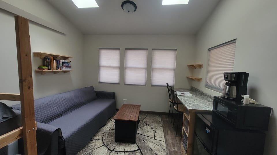Couch, coffee table and counter top workspace