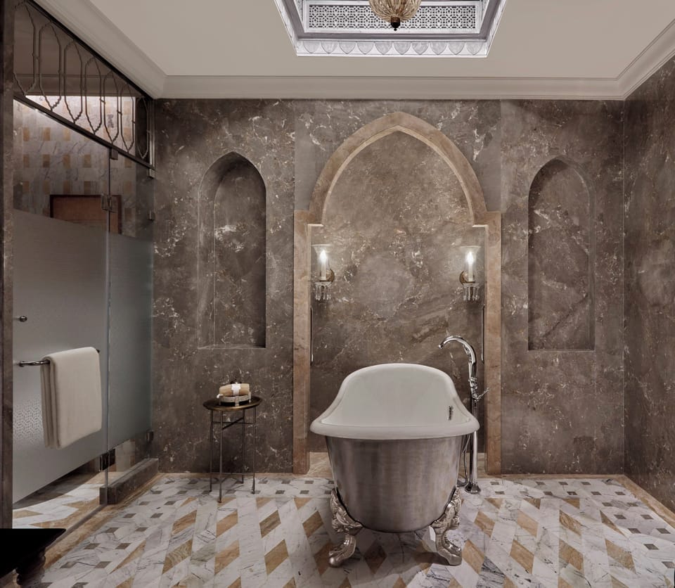 Separate tub and shower, designer toiletries, hair dryer, bathrobes