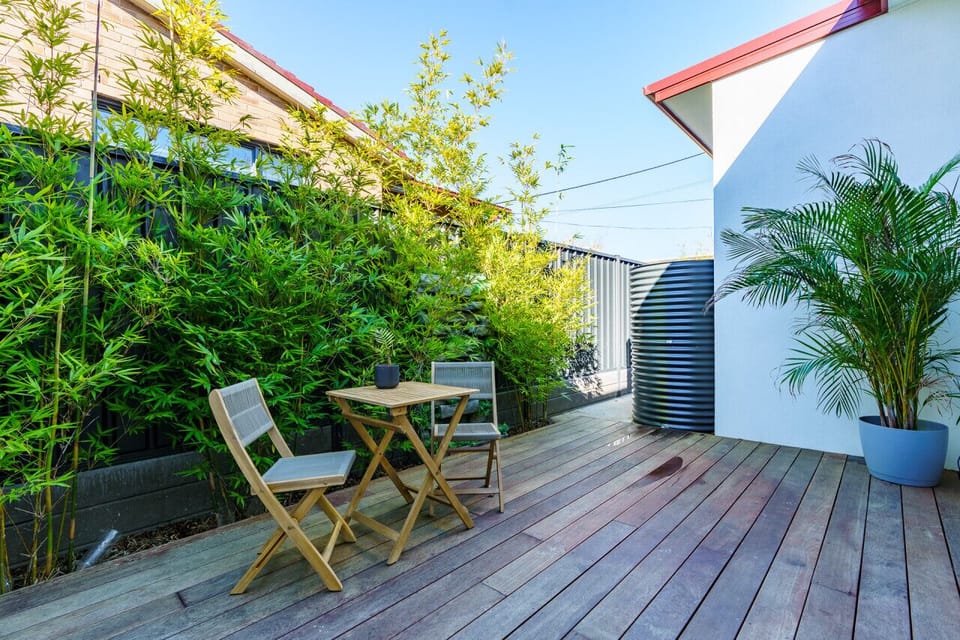 Step outside next to the formal lounge room and savor the fresh air as you relax in a thoughtfully curated outdoor space, meticulously designed for your comfort and enjoyment.