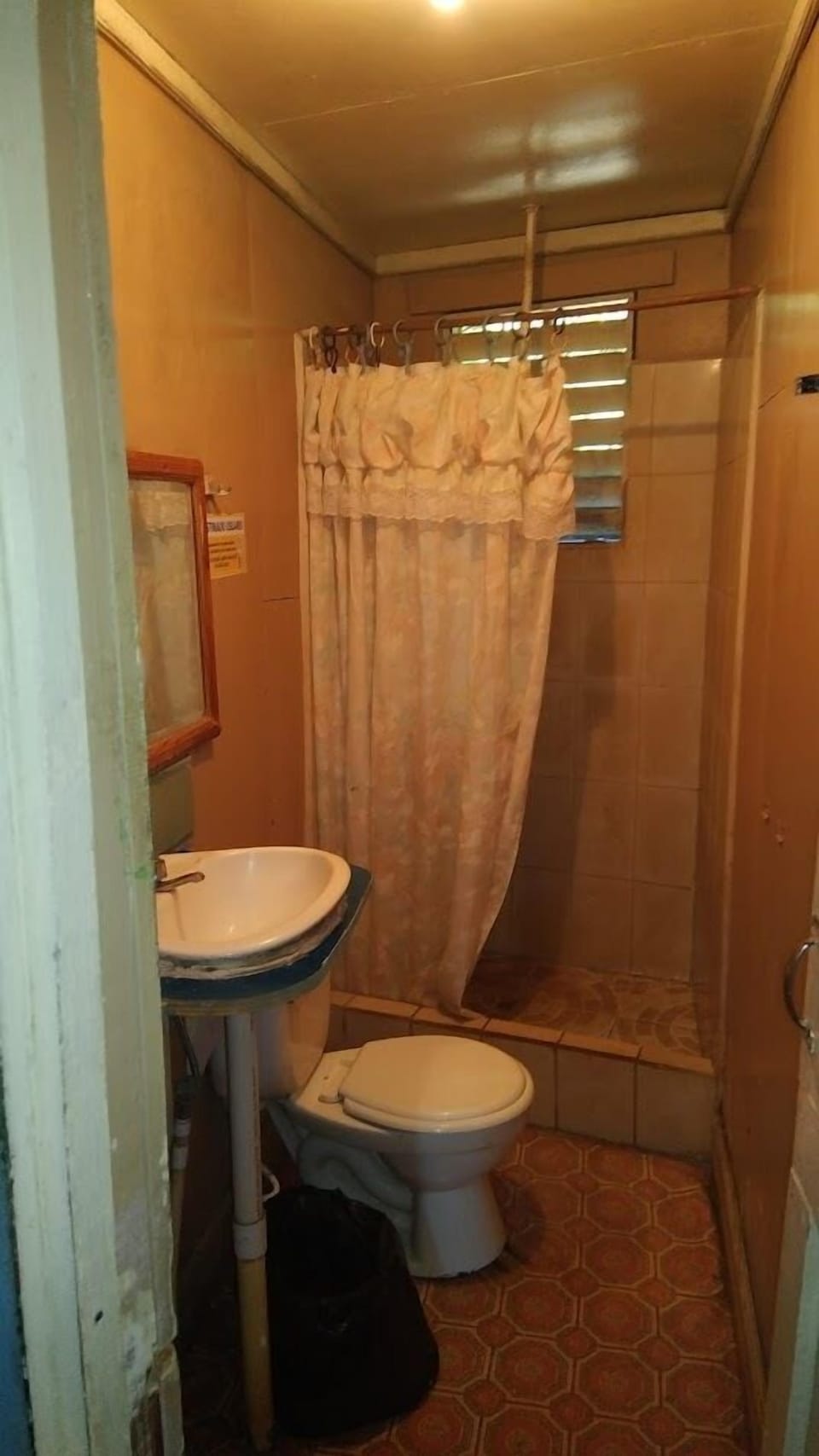 Shower, towels, toilet paper