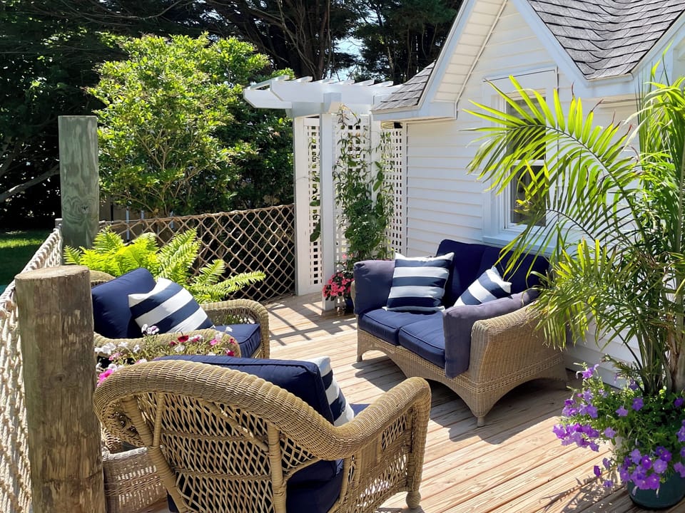 Wrap around deck offers loads of room to relax or entertain with friends