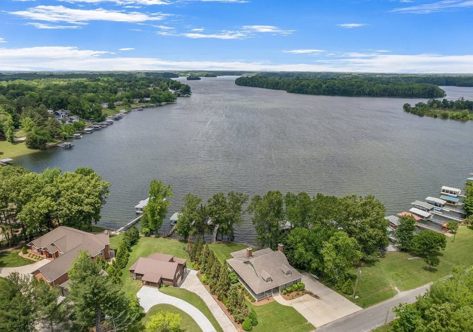 Aerial view of the home and Tims Ford Lake
