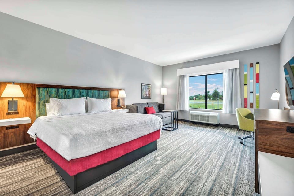 Room, 1 King Bed with Sofa bed, Refrigerator & Microwave | Living area
