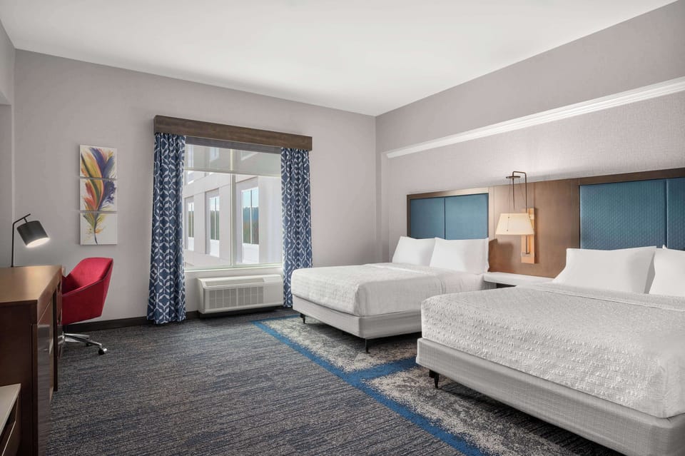 Room, 2 Queen Beds, Refrigerator & Microwave | Iron/ironing board, free WiFi