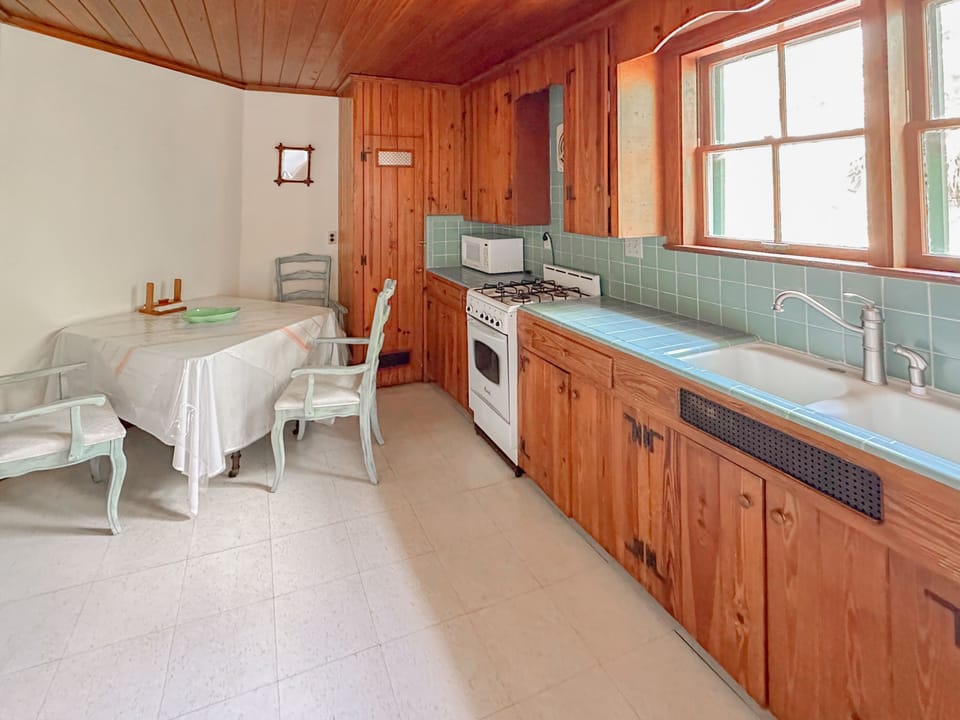Our charming kitchen with a breakfast nook.