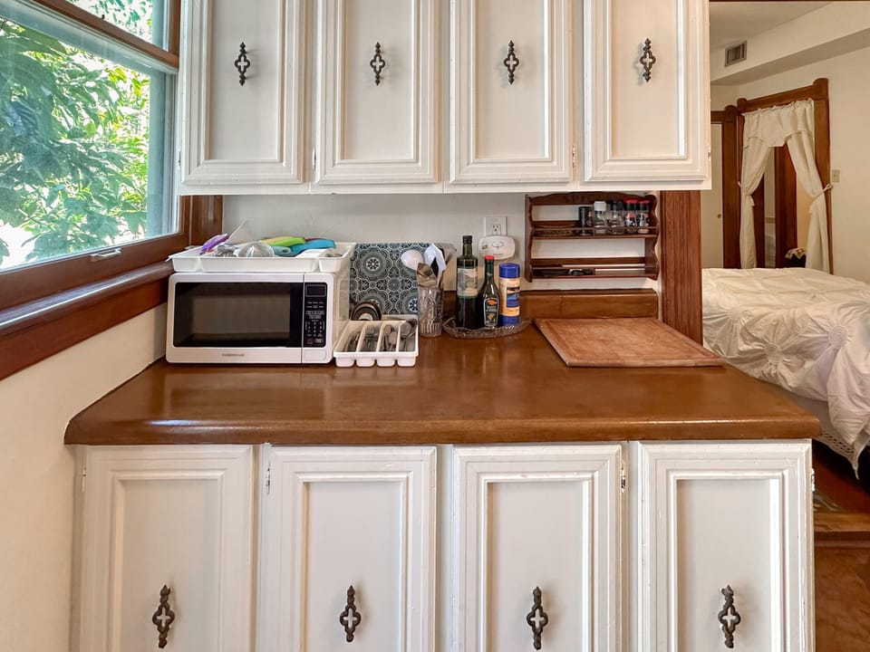 Our old-fashioned kitchen cabinets give the space a unique charm.