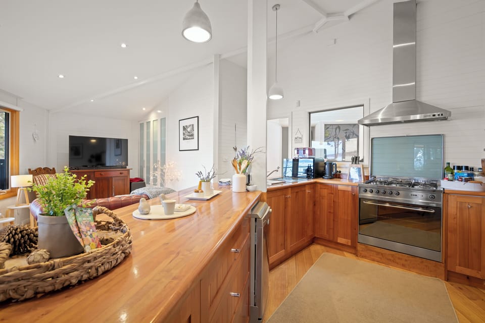 Design House, Bay View | Private kitchen | Full-size fridge, microwave, oven, stovetop