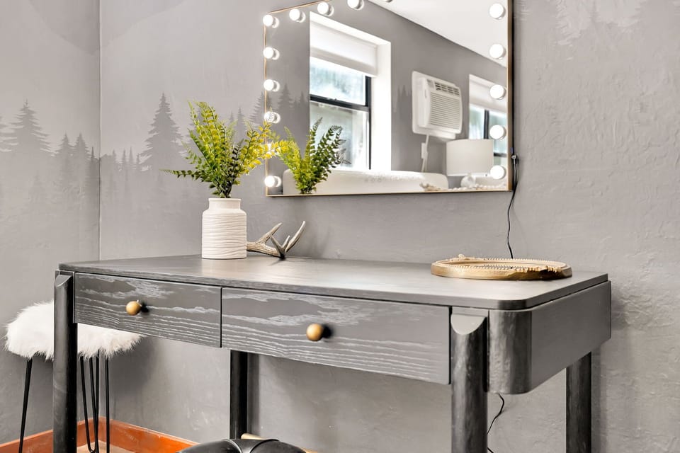 Illuminate your beauty routine with our modern vanity area